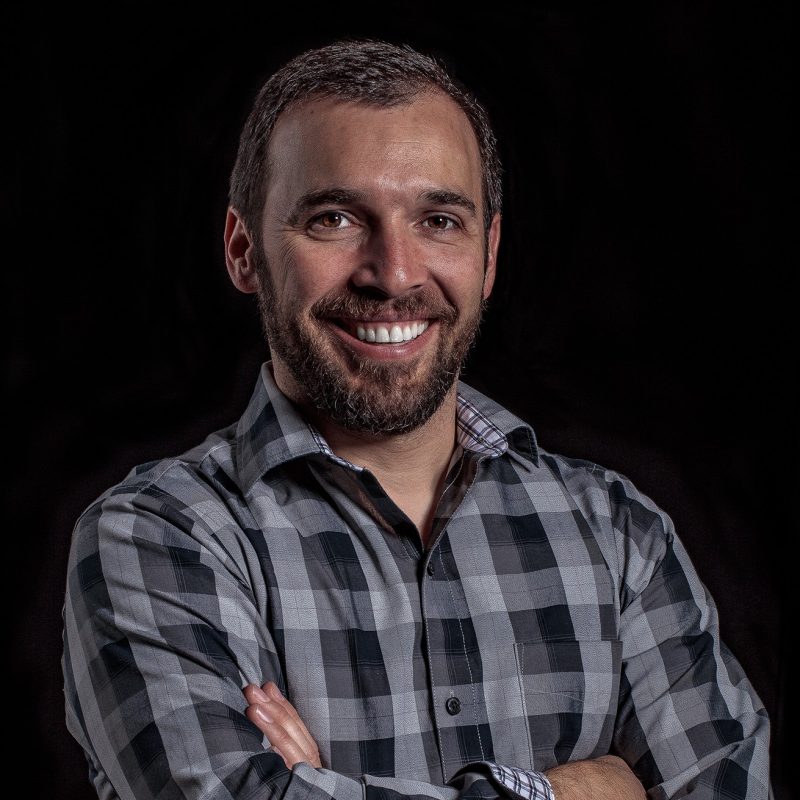 Color Photo of Adam Morgan,  an Executive Creative Director at Adobe, with experience in creativity, strategy, and storytelling for over 23 years. 